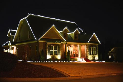 this image shows taking down Christmas lights repairs in Rancho Cordova, CA